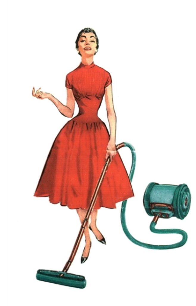 Housekeeper with a vacuum cleaner