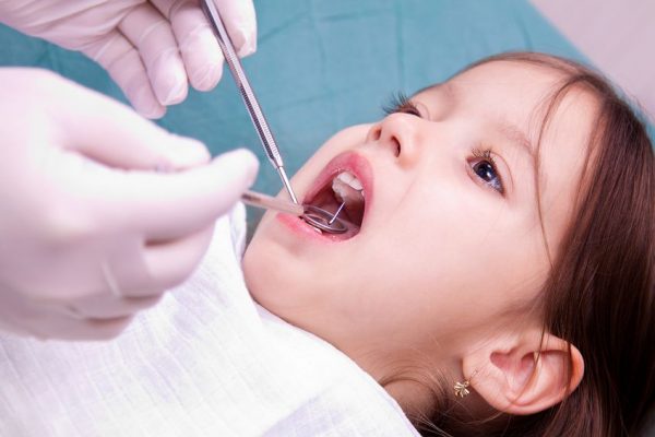 Is Gaming to Blame for Your Kid’s Tooth Decay?