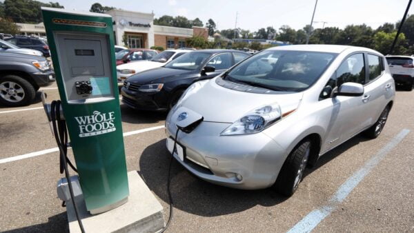 Why are electric car charging stations expanding?